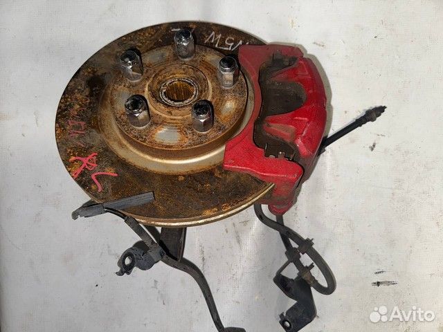 Кулак поворотный левый Mitsubishi Outlander XL