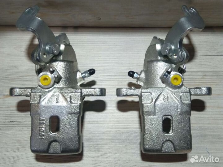 Суппорт задний правый / левый hyundai elantra 3