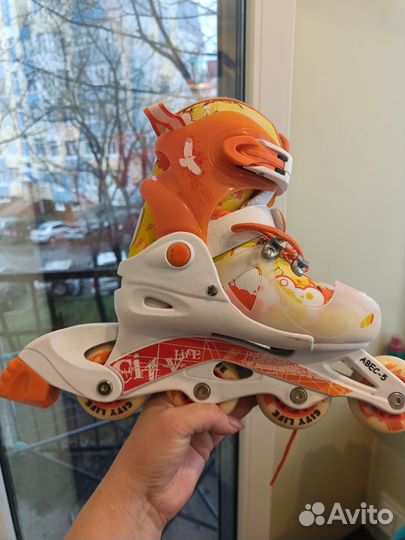 Роликовые коньки