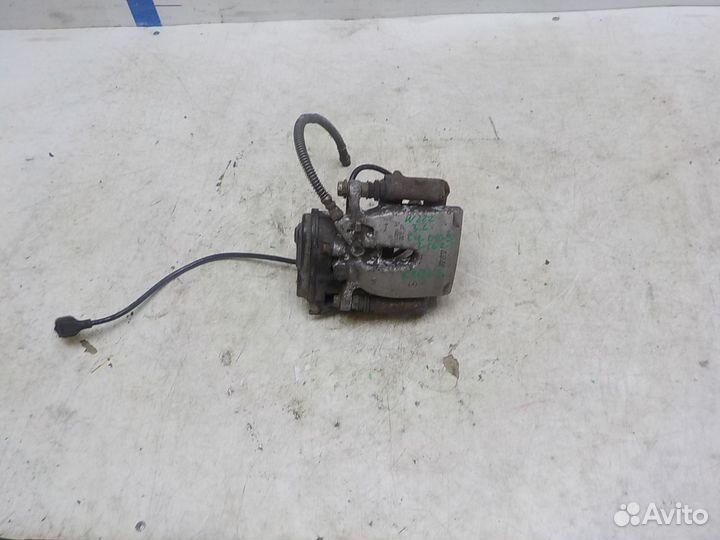 Суппорт тормозной задний левый Mercedes-Benz W222