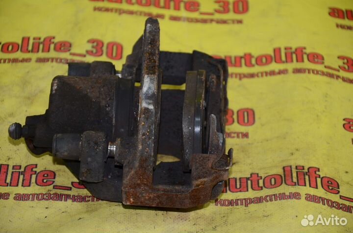 Супорт тормозной передний левый Ford Focus 2