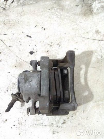 Суппорт тормозной задний правый Volkswagen Passat