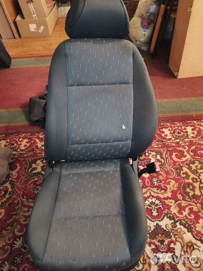 Передние кресла и задний диван Octavia Tour