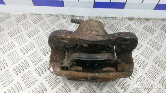 Суппорт тормозной передний левый hyundai tucson JM