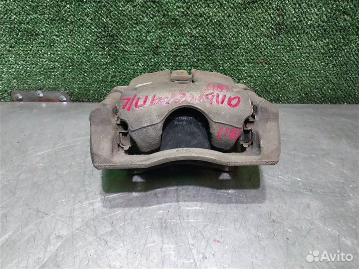 Суппорт тормозной передний левый Nissan Almera G15