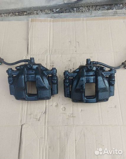 Суппорт тормозной передний Хонда CR-V3 RE