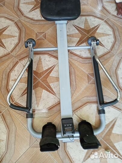 Гребной тренажер torneo