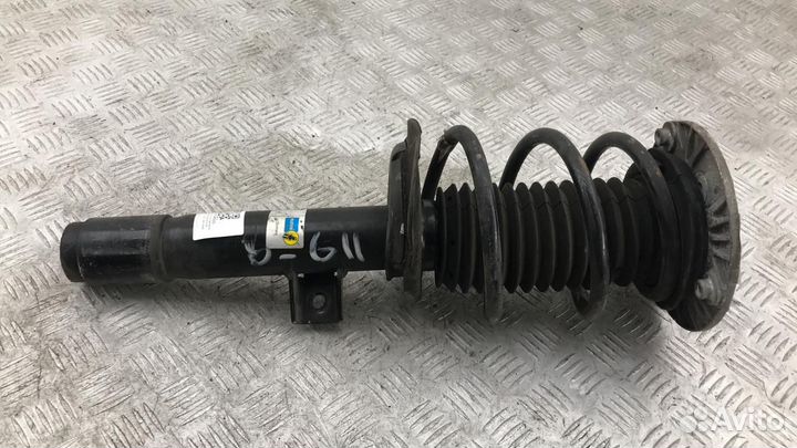 Стойка амортизатора передняя левая BMW 3