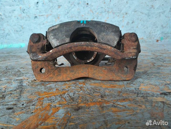 Суппорт передний левый Kia Spectra 1 рест 2