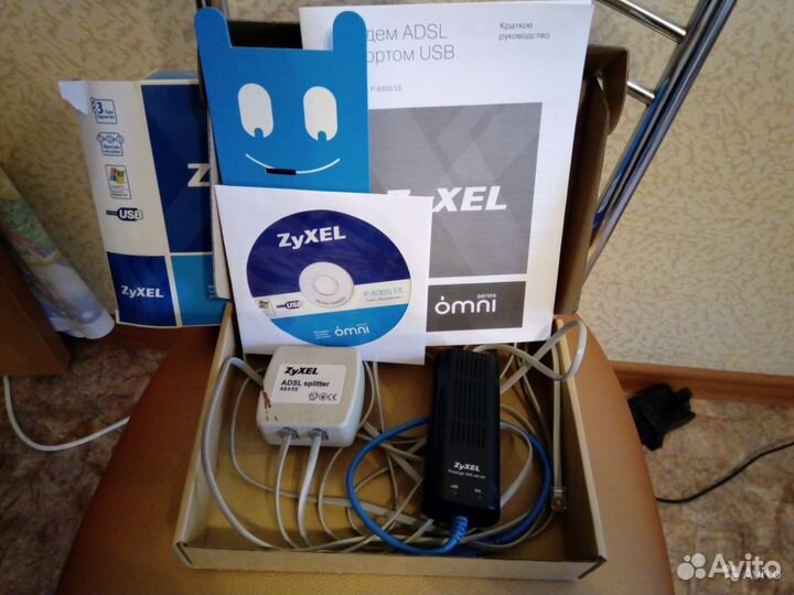 Модем и сплиттер adsl Zyxel