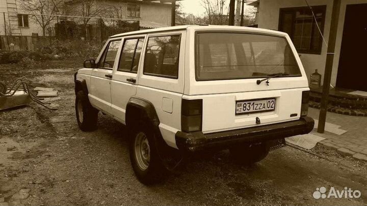 Заднее стекло на Jeep Cherokee с подогревом