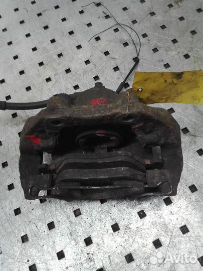 Суппорт передний левый Opel Omega