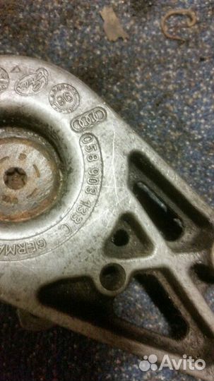 Натяжитель ремня VAG 058903133C