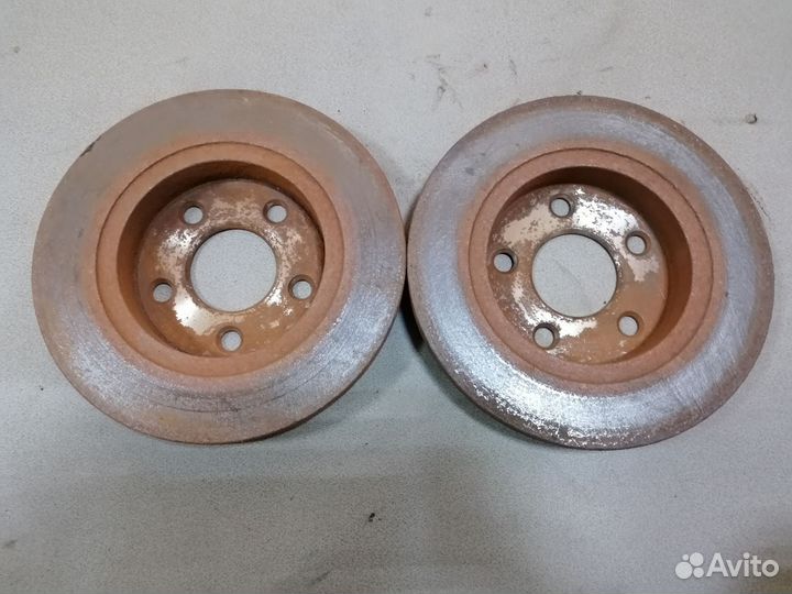 Диск тормозной невентилируемый зад.Ford Taurus 2