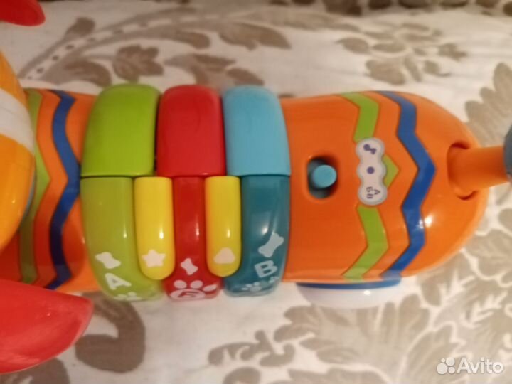 Собака каталка музыкальная