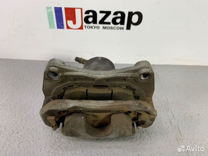 Тормозной суппорт передний левый Nissan Juke F15