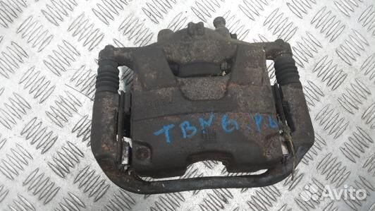 Суппорт тормозной передний левый opel astra J (TBN