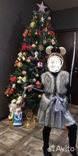 Меховая жилетка