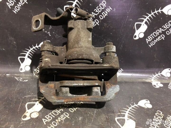 Суппорт тормозной задний левый Kia Soul 1.6 G4FD