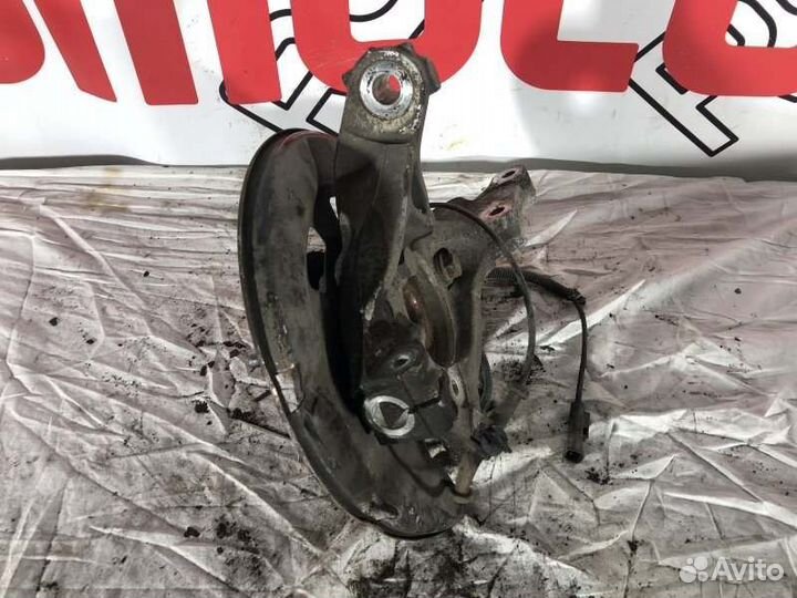 Кулак поворотный передний левый Opel Astra J До