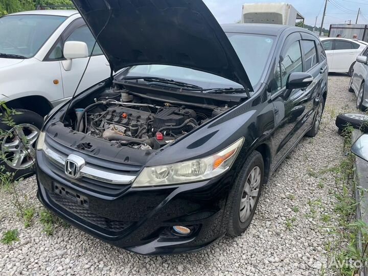 Двигатель Honda Stream RN6 R18A 2009