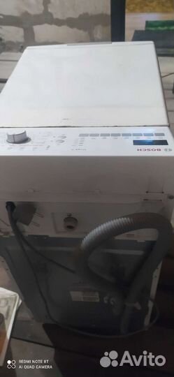 Стиральная машина с вертикальной загрузкой