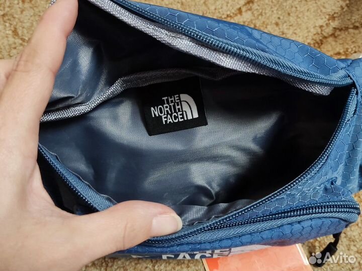 Поясная сумка the north face