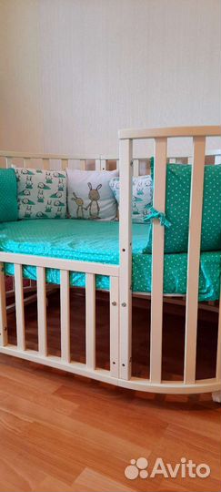 Детская кроватка-трансформер с маятником