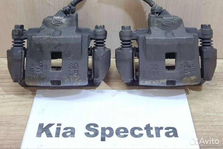 Суппорт тормозной передний Kia Spectra, 2004г