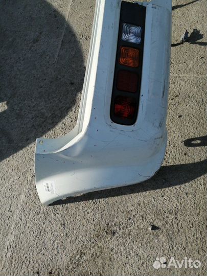 Бампер задний Nissan Cube Z11