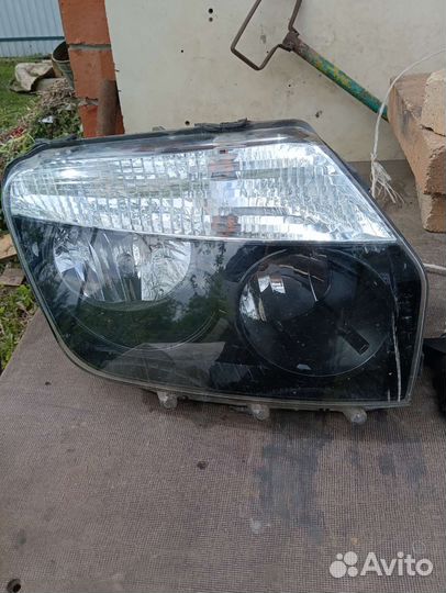 Фара правая Рено Дастер 2012г с повреждениями
