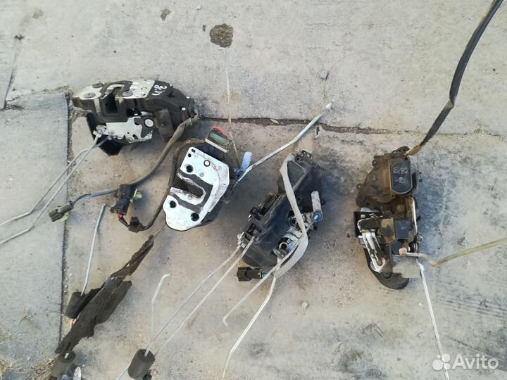 Замки механизмы дверей Kia Spectra