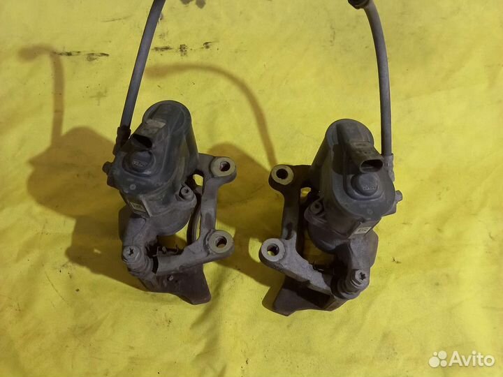 Суппорт задний электро Vw Passat Tiguan