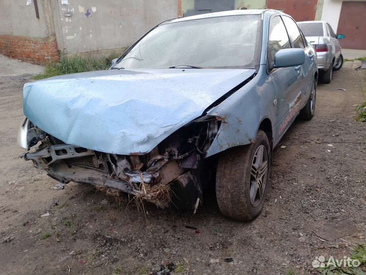 В разборе разбор Лансер 9 1.3 А.Т