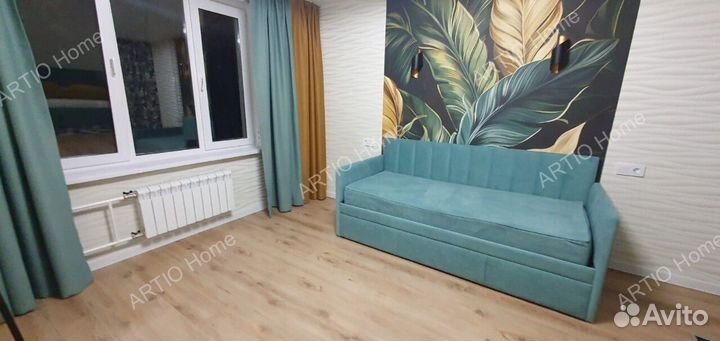 Кровать с подъемным механизмом