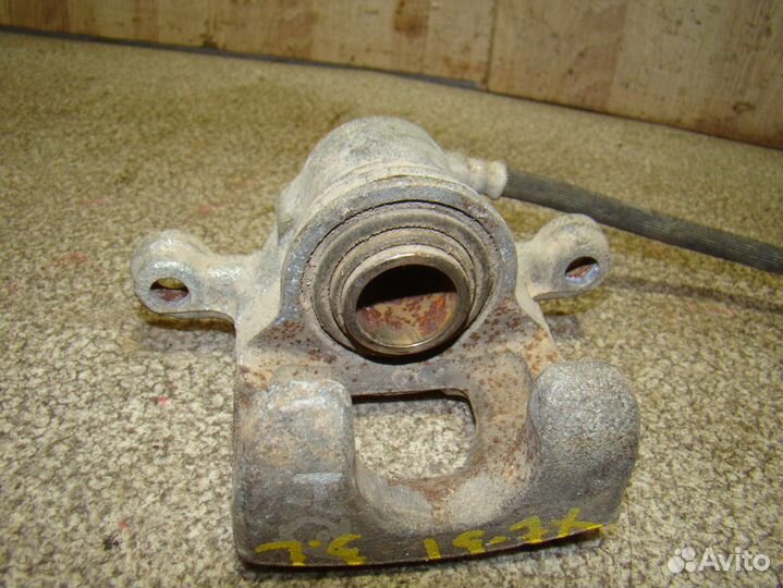 Суппорт задний левый Nissan X-Trail (T31)