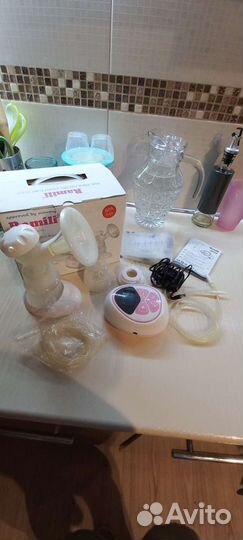 Электрический молокоотсос