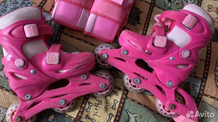 Роликовые коньки