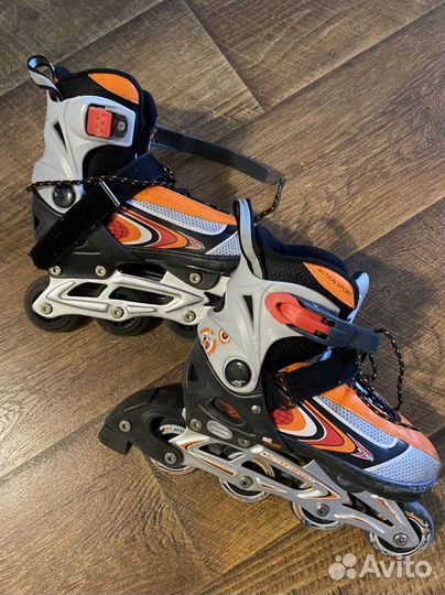 Роликовые коньки