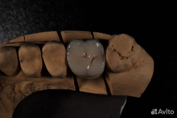 Зубной техник