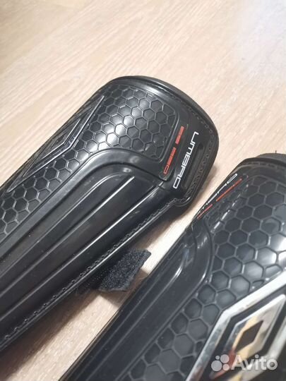 Щитки футбольные umbro