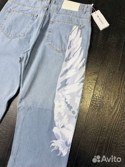 Джинсы Lacoste