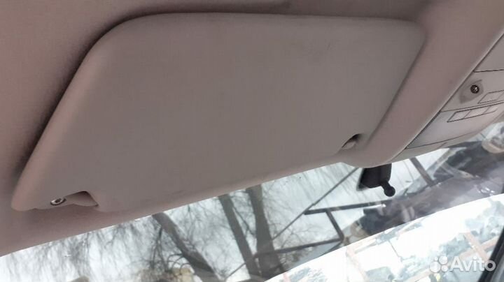 Козырек солнцезащитный левый Opel Astra H