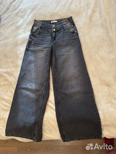Джинсы широкие