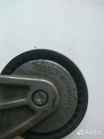 Натяжитель приводного ремня двигателя VW Tiguan 1