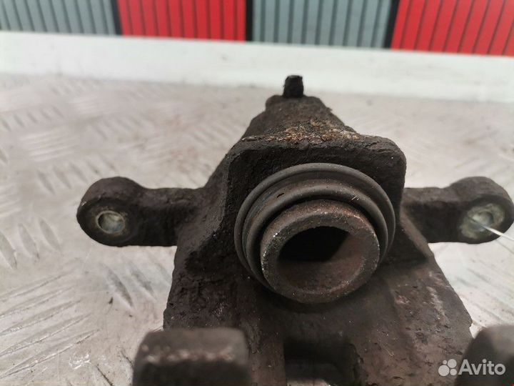 Суппорт задний левый Hyundai i20 PB 2010