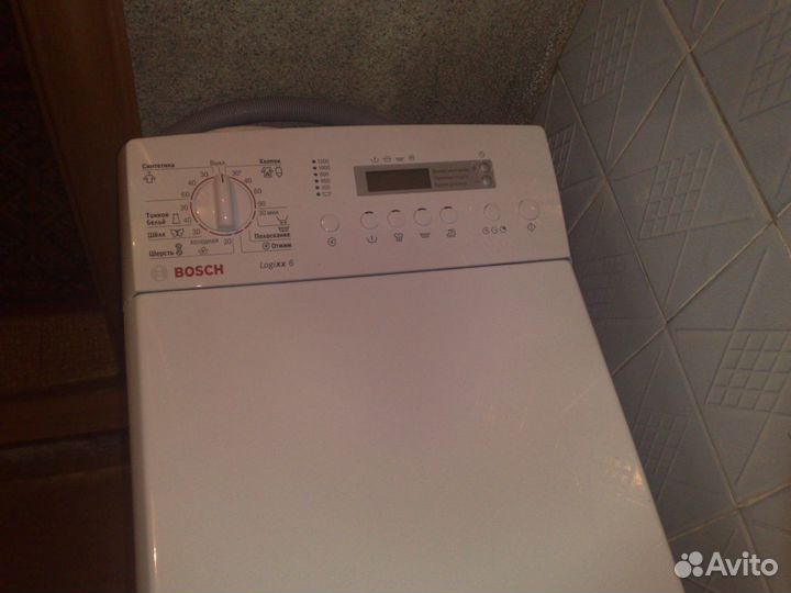 Вертикальная стиралка Bosch WOT 24550 24551 24552