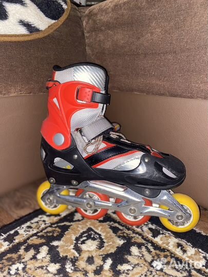 Роликовые коньки