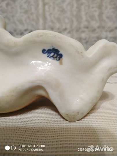 Статуэтка львенок