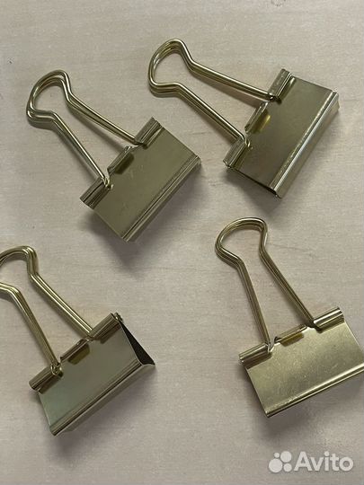 Золотые зажимы для бумаги